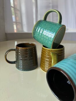 Set Of Four Reactive Glaze Mugs In Lagoon Glazes, 2 of 9