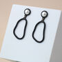 Matte Black And Pearl Wavy Drop Earrings, thumbnail 3 of 3