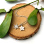 Personalised Sterling Silver Snowflake And Initial Star Necklace, thumbnail 1 of 9