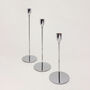 G Decor Verro Set Of Three Modern Silver Stainless Steel Candle Holders Sleek Weighted Dinner Candlesticks, thumbnail 1 of 5