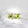 14k Solid Gold Peridot Stud Earrings, thumbnail 6 of 10