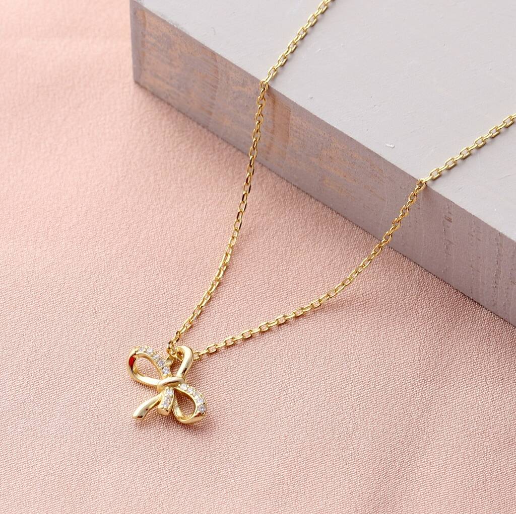Gold Sparkle Bow Pendant Necklace By Attic | notonthehighstreet.com