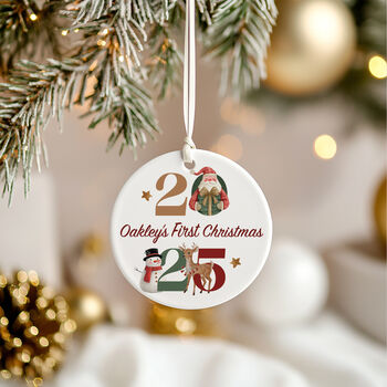 Personalised 2025 Baby's First Christmas Ceramic Bauble In Red, Pink Or Blue, 5 of 9