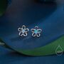 Sterling Silver Tiny Blue Opal Flower Stud Earrings, thumbnail 1 of 11
