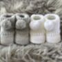 White Knitted Baby Booties With Pom Pom, thumbnail 2 of 9