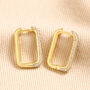 Rectangular Crystal Huggie Hoop Earrings In Gold, thumbnail 1 of 3