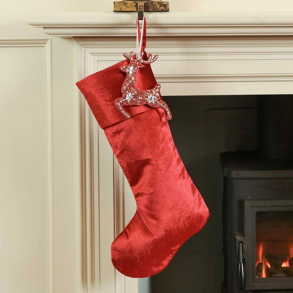 personalised luxury ruby red velvet christmas stocking by dibor  notonthehighstreet.com