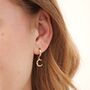 Crescent Moon And Star Huggie Hoops In Gold Plating, thumbnail 6 of 7