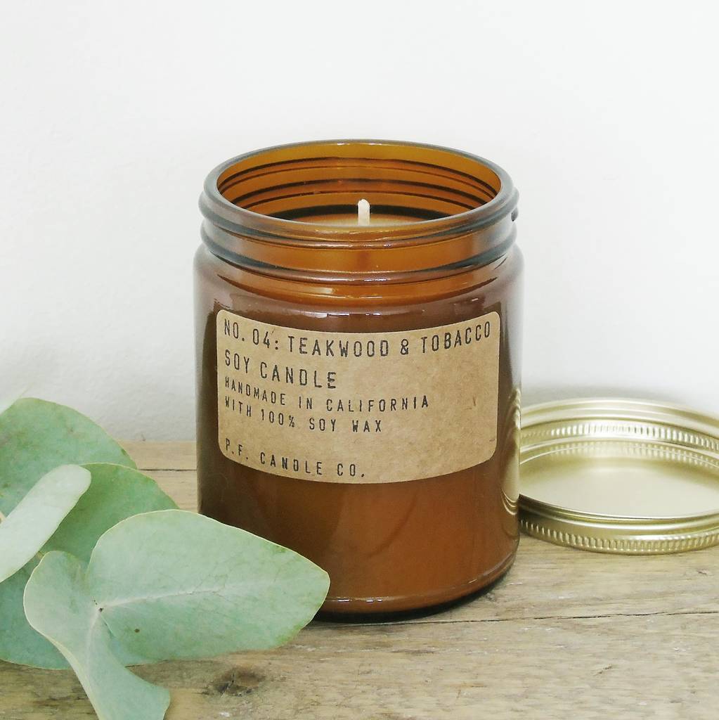 p.f. candle co. teakwood and tobacco soy candle by the den & now ...