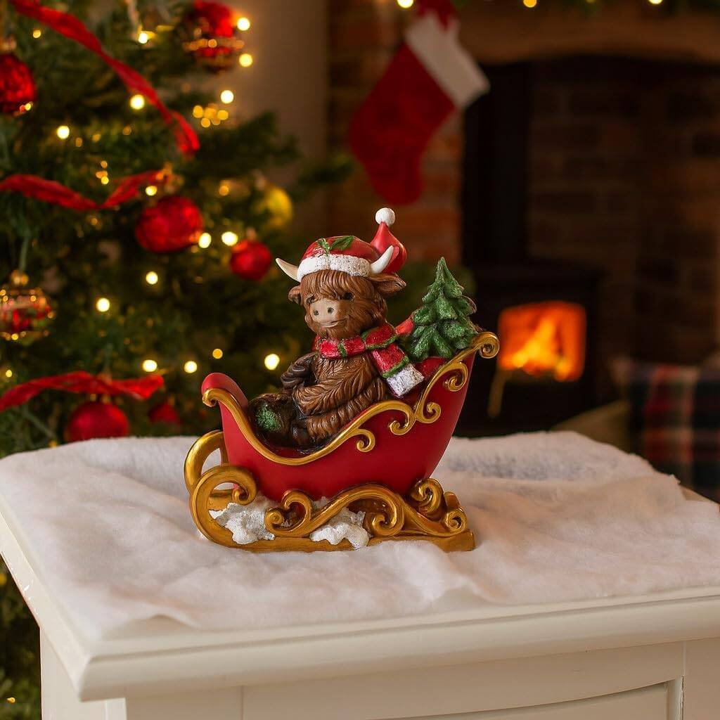 Christmas Highland Cow On A Sleigh Ornament