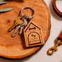 'Paws Welcome' Dog House Shaped Keyring, thumbnail 1 of 3