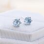 Genuine Blue Topaz Stud Earrings In Sterling Silver, thumbnail 1 of 11