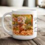 Personalised Autumn Deer Playing In Leaves Gift Mug, thumbnail 1 of 2