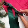 Luxury Christmas Pyjama Gift Set For Her – Deep Pink Satin Pjs, Candle, Socks And Hair Bow, thumbnail 5 of 9