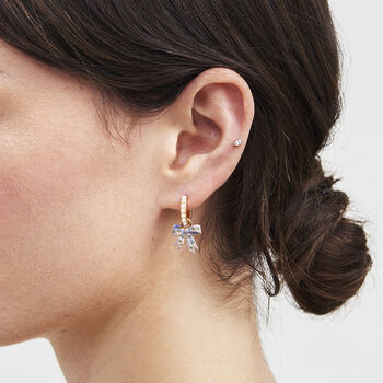 Gold Forget Me Not Bow Huggie Earrings, 2 of 9