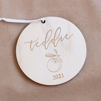 Personalised Wooden First Christmas Bauble, 2 of 4