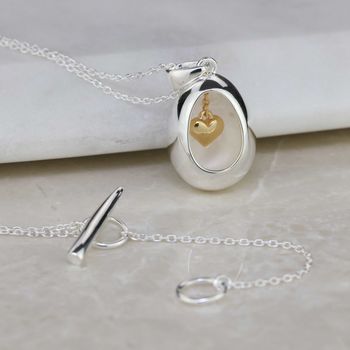 Oval Pendant With Miniature Hanging Heart, 2 of 6