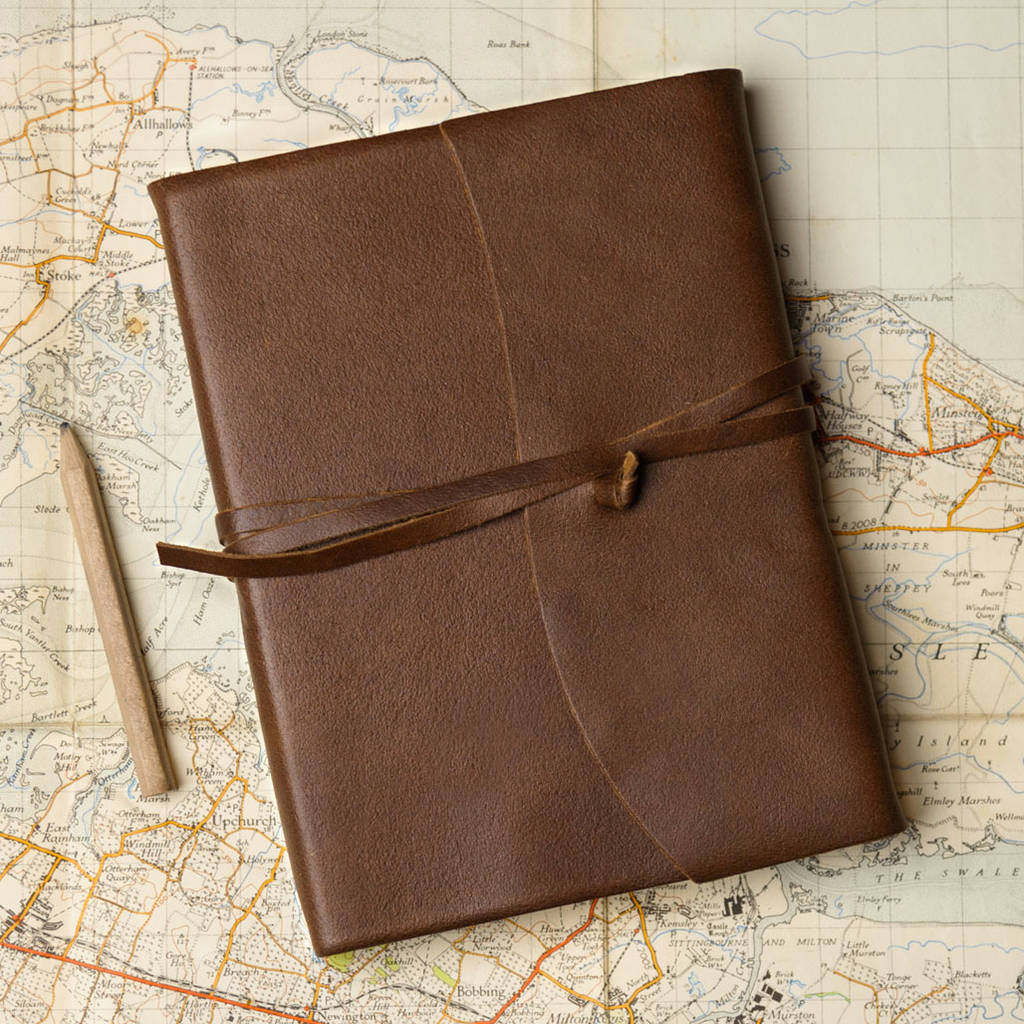brown leather travel journal
