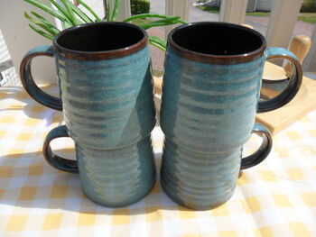 Set Of Four Reactive Glaze Brûlée Mugs In Lagoon Blue And Dark Chocolate, 3 of 7
