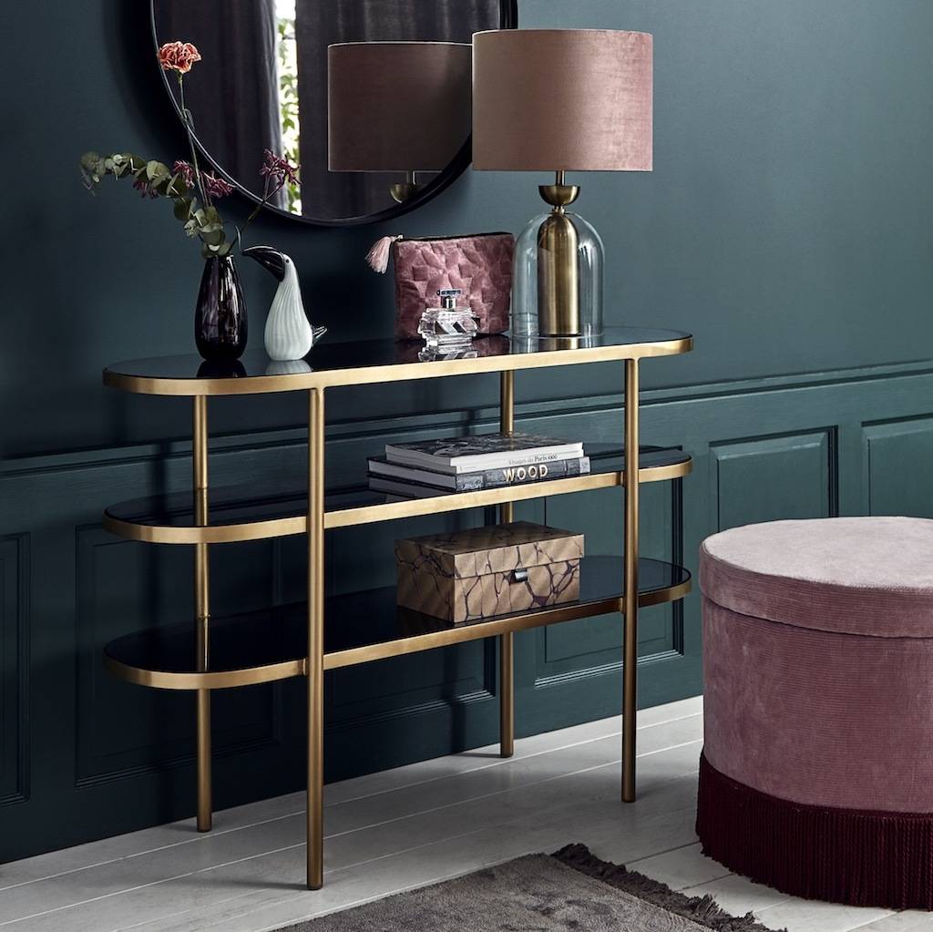 Golden Oval Console Table With Black Glass