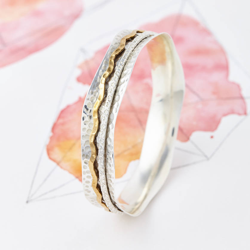 aura silver spinning bangle by charlotte's web jewellery ...