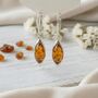Handmade Baltic Amber Silver Dangle And Drop Earrings, thumbnail 1 of 2