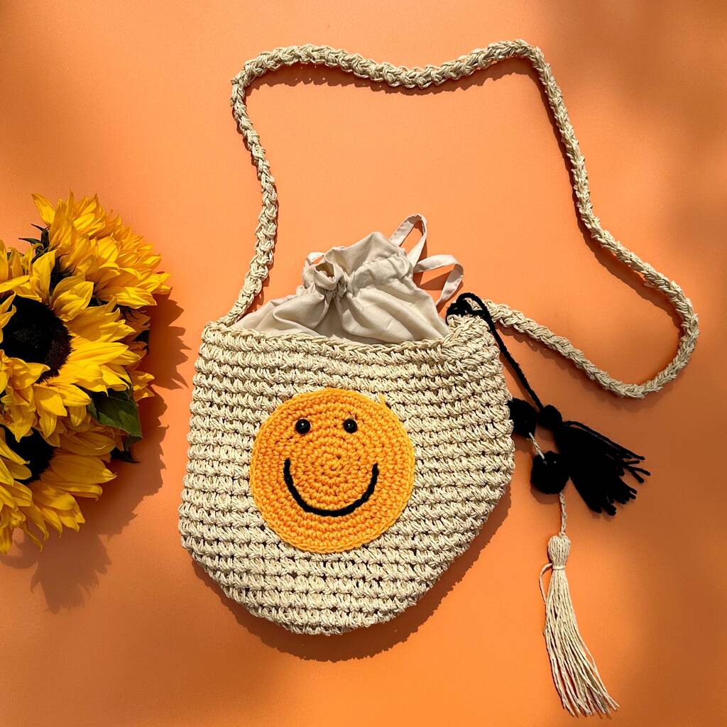 Smile Face Woven Shoulder Strap Bucket Bag By Lucent Studios