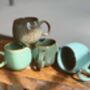 Set Of Four Reactive Glaze Mugs In Tones Of The Rainforest, thumbnail 5 of 11