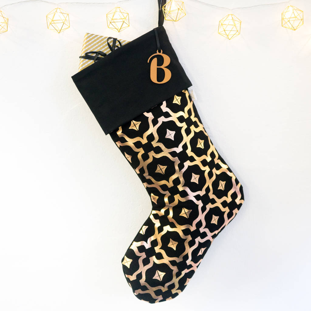 personalised large christmas stocking in black by penelope ...