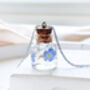 Cremation Ashes Bottle Necklace With Forget Me Nots, thumbnail 1 of 8