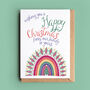 'From Our Family To Yours' Christmas Rainbow Card, thumbnail 1 of 2