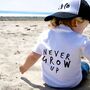 Never Grow Up Unisex Baby And Kids Short Sleeve T Shirt, thumbnail 1 of 12
