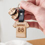 Daddy’s Team Wooden Football Shirt Keyring With Charms, thumbnail 1 of 4