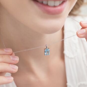 Blue Topaz Emerald Cut Pendant Necklace In Sterling Silver And Gold, 2 of 11