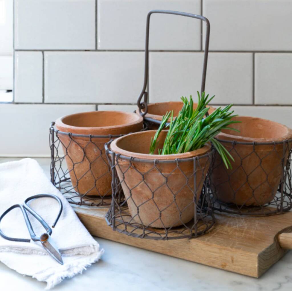 Aged Terracotta Pots In Wire Basket By The Wedding of my Dreams
