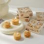 A Box Of Four Biscuit Shape Candles, thumbnail 3 of 5