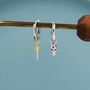Mismatched Tiny Skull And Sword Huggie Hoop Earrings In Sterling Silver, thumbnail 1 of 7