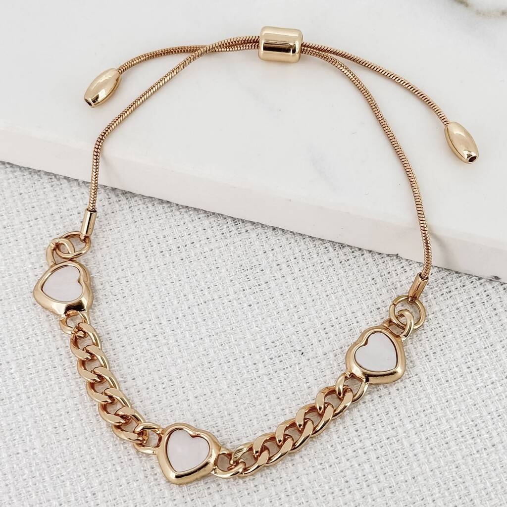 White And Gold Curb Chain Bracelet With Three Hearts, 1 of 3