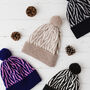 Lambswool Knitted Zebra Pom Pom Hat, thumbnail 1 of 12
