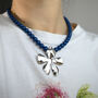Statement Navy Bead And Silver Flower Necklace, thumbnail 1 of 4