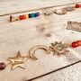 Recycled Brass Sun Moon And Star Chakra Hanging Bell, thumbnail 7 of 8