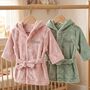 Personalised Baby Dressing Gown Floral Or Dino Print, thumbnail 1 of 12