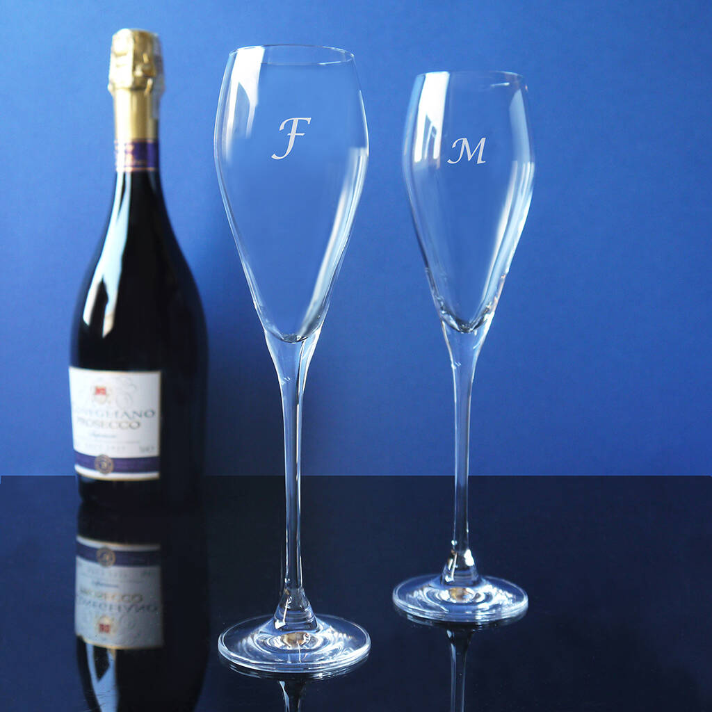 A Pair Of Glass Vintage Champagne Flutes By Inkerman London