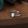 White Fire Oval Opal Ring In Sterling Silver, thumbnail 1 of 11