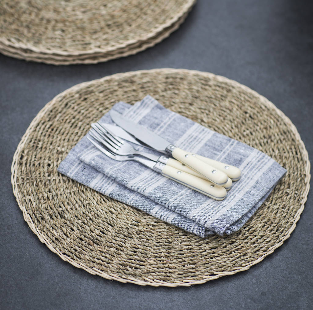 set of four seagrass placemats by garden trading