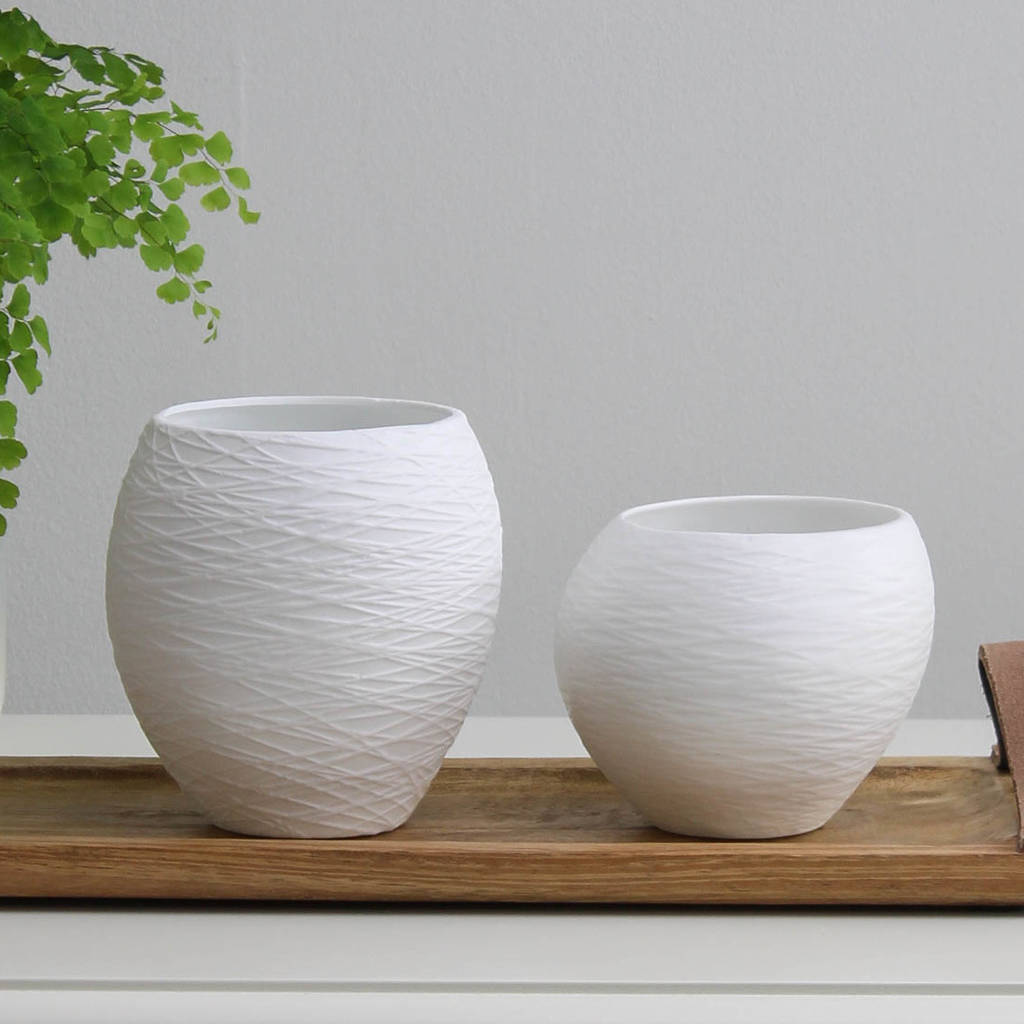 two white textured porcelain pots by marquis & dawe