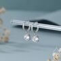 Double Prong Cz Huggie Hoop In Sterling Silver, thumbnail 1 of 11