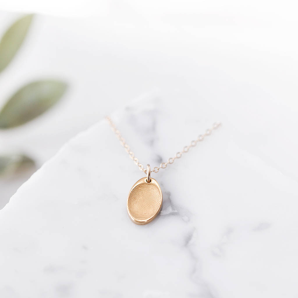 personalised tiny gold fingerprint necklace by button and bean
