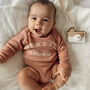 'Spread Kindness' Unisex Organic Cotton Baby Bodysuit, thumbnail 1 of 3