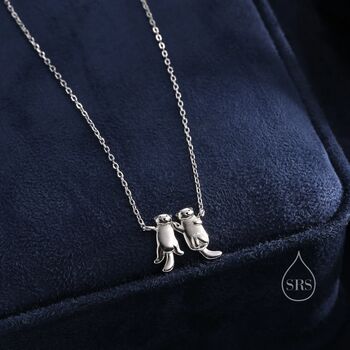 Sterling Silver Otter Holding Hands Pendant Necklace, 2 of 11